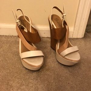 Tan and white platform heels